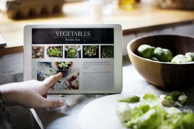 Nutrition facts of fresh vegetable on digital tablet